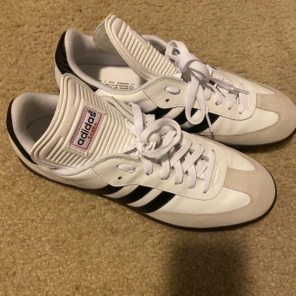 Men’s brand new black and white Adidas size 10.5